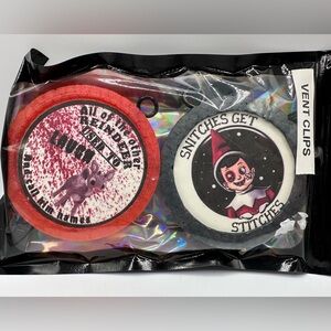 2 Apple Cinnamon vent clips—“Snitches Get Stitches” & bloody reindeer